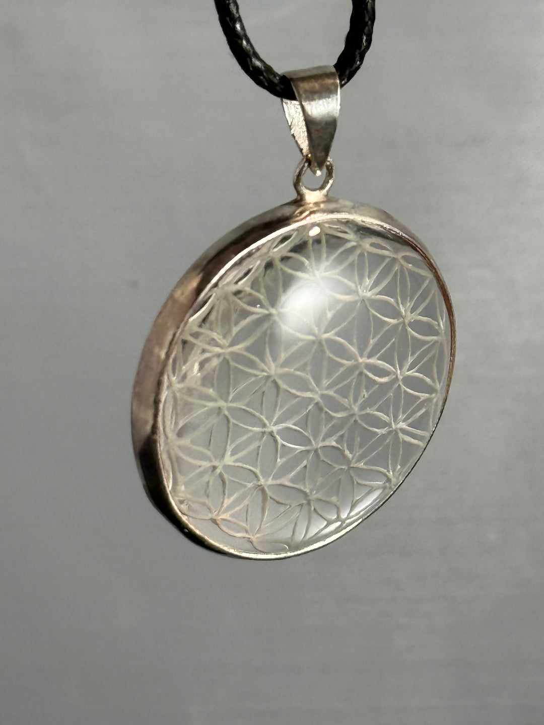 Hand Carved Flower of Life in Quartz